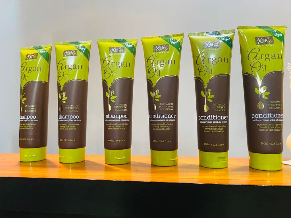 XHC Argan Oil shampoo and conditioner tubes